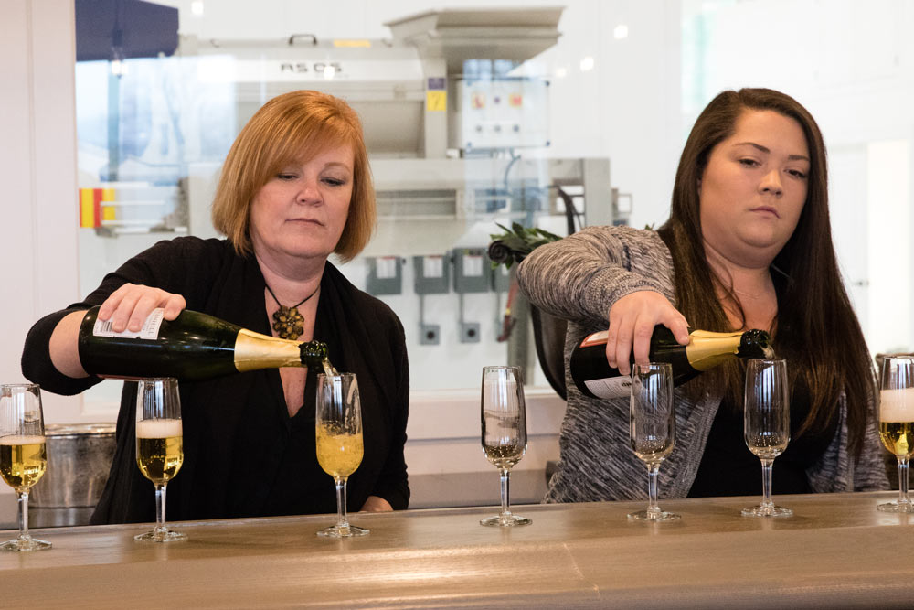 Greenhill staff poured countless glasses of sparkling wine on opening night.