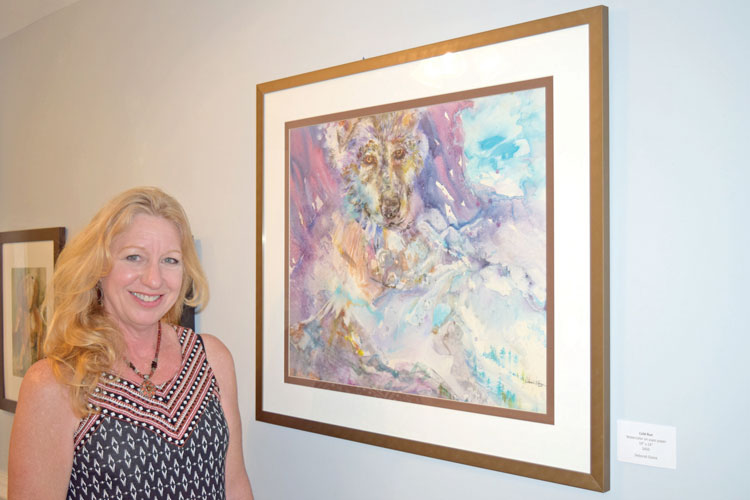 Deborah Elaine with her colorful and powerful piece, titled Cold Run.