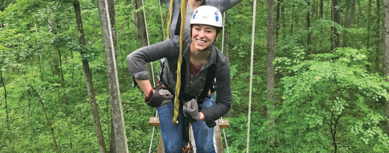 Posing on one the suspension bridges on the Empower Adventures course.