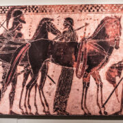 Attributed to the Sappho Painter, Greek (Attic), Black Figure White Ground Lekythos, ca. 510 BCE, Quadriga chariot horses being harnessed, terracotta, 8.75-x-2.375, Private Collection, Virginia. Photo by Eryn Gable of Focal Point Creative