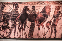 Attributed to the Sappho Painter, Greek (Attic), Black Figure White Ground Lekythos, ca. 510 BCE, Quadriga chariot horses being harnessed, terracotta, 8.75-x-2.375, Private Collection, Virginia. Photo by Eryn Gable of Focal Point Creative