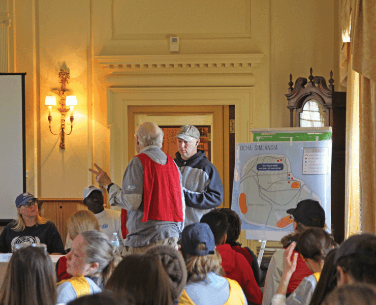 NGO representatives present their findings to the UN Council