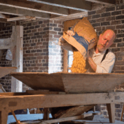 Miller Mike Devine explains the milling process.