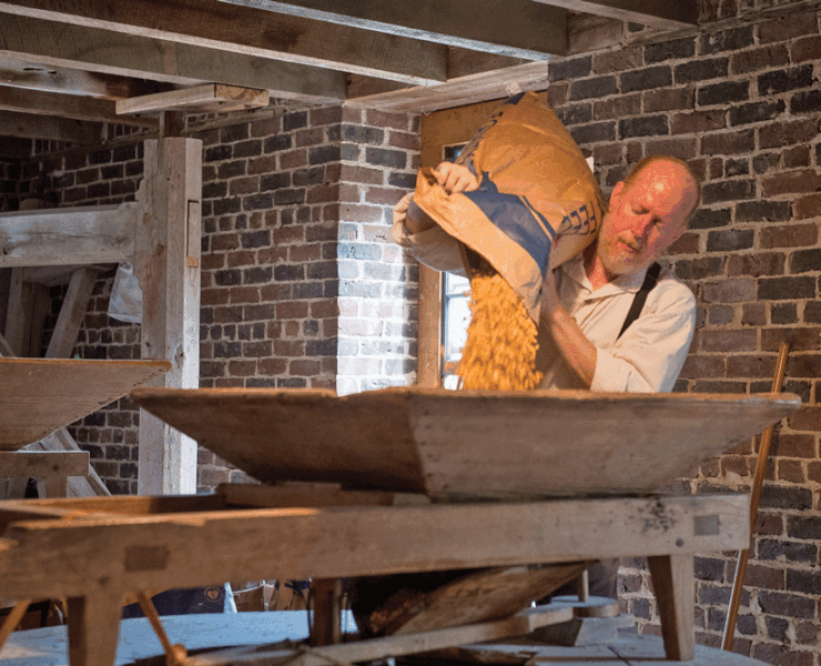 Miller Mike Devine explains the milling process.