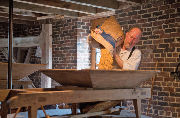 Miller Mike Devine explains the milling process.