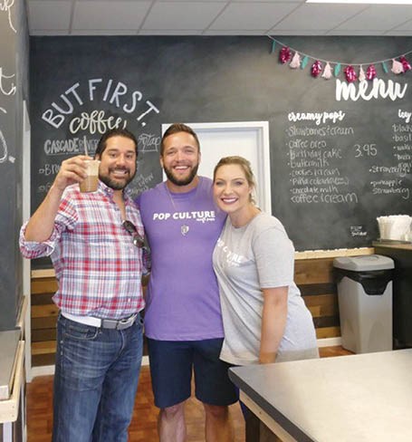 Reuben Bajaj (left), owner of The Shoppes at Main and Maple - White Star Investments, with Pop Culture owners Joel Rogozinski and Holly Bagwell.