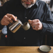 Brandon Belland of Cordial Coffee practicing his cupping. Photo by Hilary Hyland Photography.
