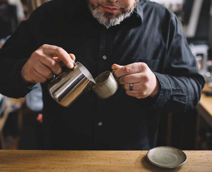 Brandon Belland of Cordial Coffee practicing his cupping. Photo by Hilary Hyland Photography.